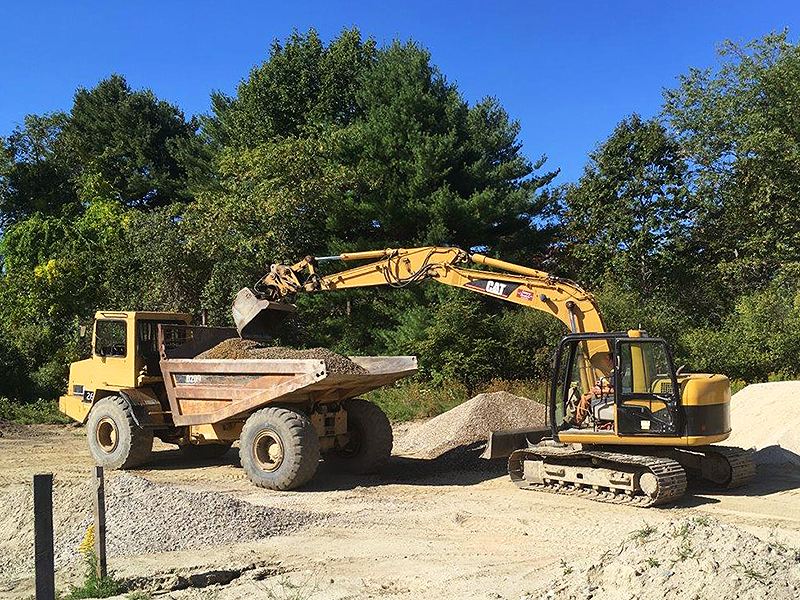 Storey Brothers digging two cottage sites on Ivy Lane, prepping for foundation pouring next week.