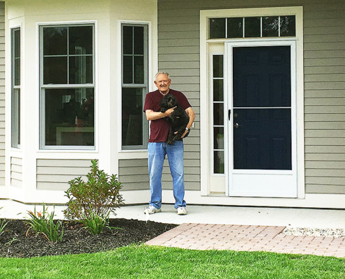 Cumberland Crossing's first residents - Ron and dog Zoe.