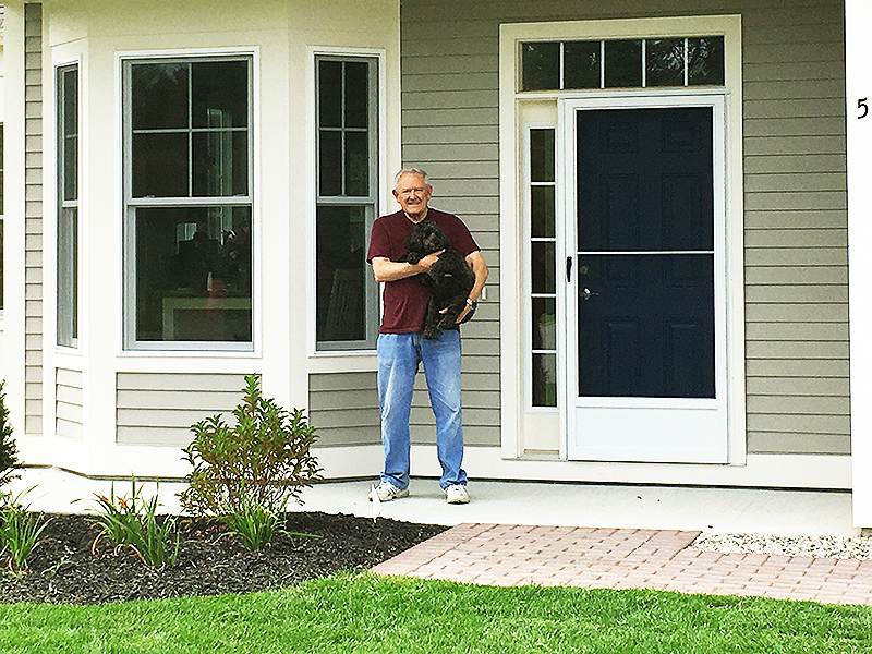 Cumberland Crossing's first residents - Ron and dog Zoe.