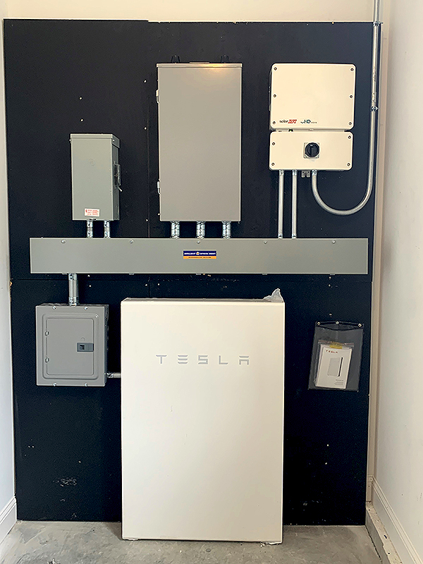 Tesla Powerwall installed in Cumberland Crossing Model Cottage.