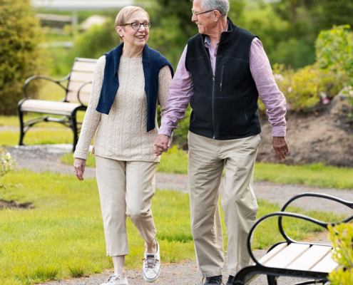 what to know about retirement communities | Couple exercising together | New Years resolution ideas